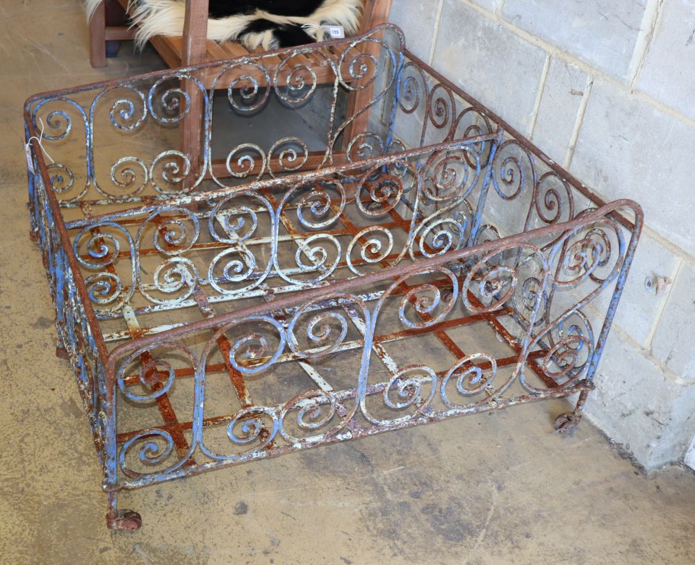 A Victorian wrought iron painted double childs crib, W.100cm, D.100cm, H.57cm